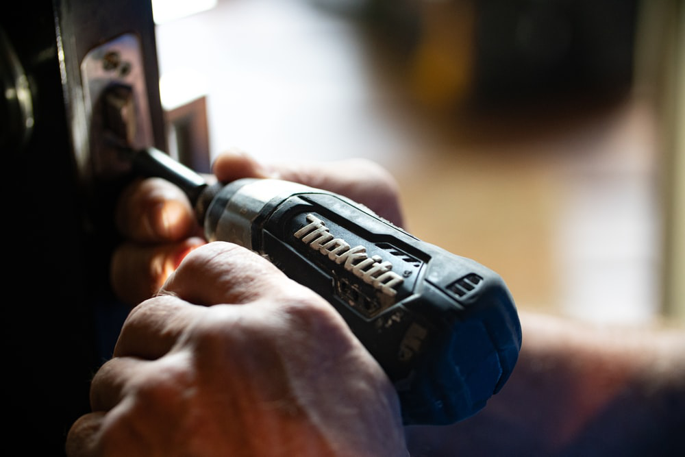 Handyman working in an apartment.